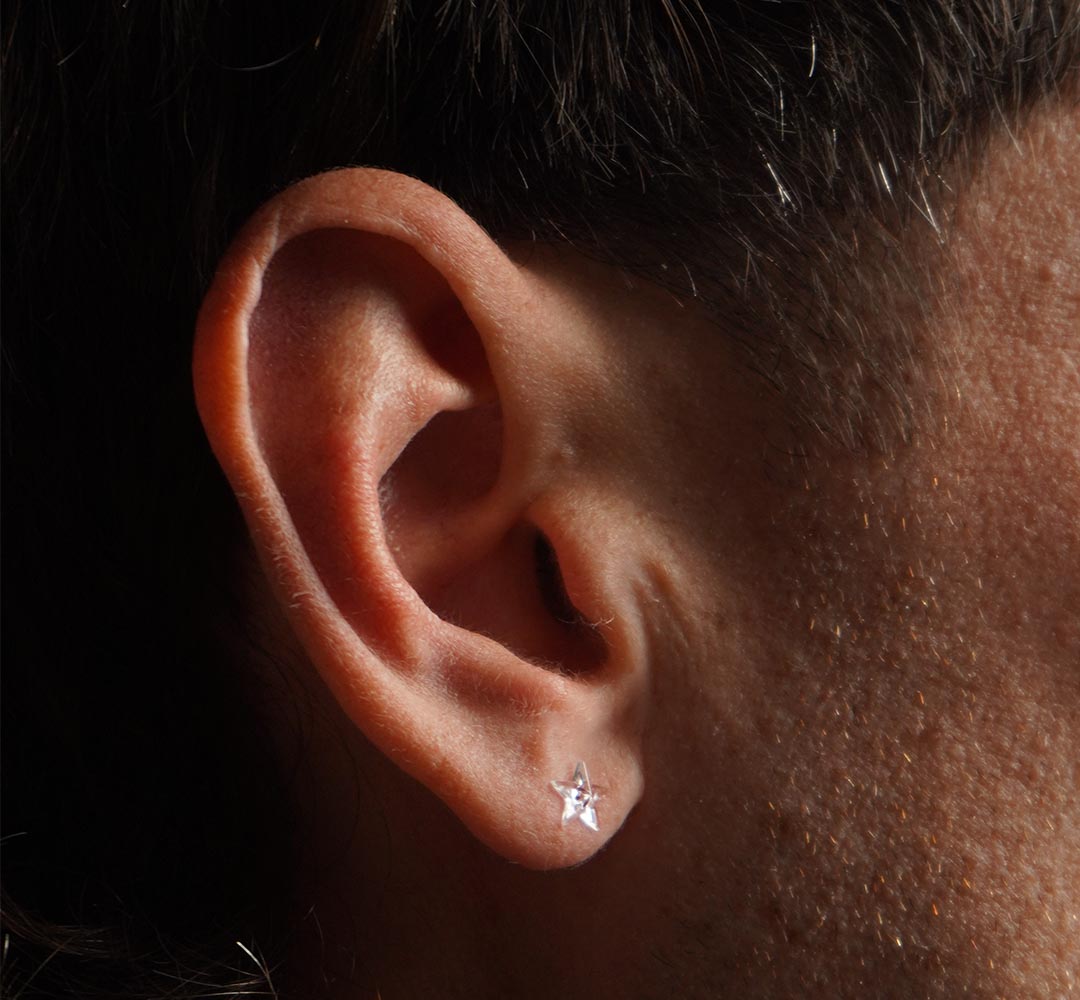 Arete transparente de acrilico en forma de estrella